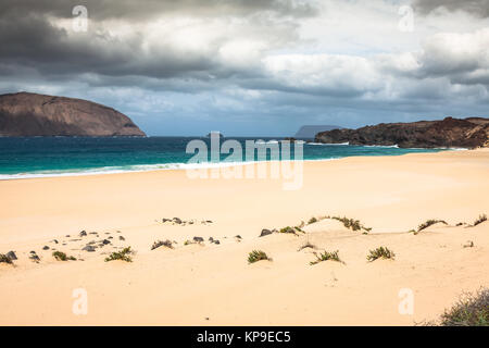 a view of playa de las conchas,a beautiful beach on la graciosa,a small island near lanzarote,canary islands,in the middle of the atlantic ocean. Stock Photo