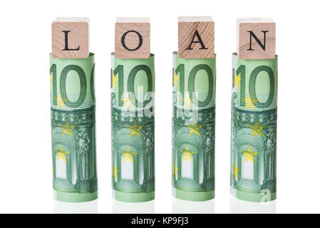 Loan Blocks Arranged On Rolled Euro Notes Stock Photo