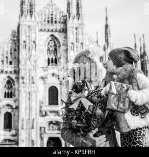 Fun Christmas family trip to Milan, Italy. smiling modern mother and