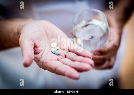 Woman taking medication. Stock Photo