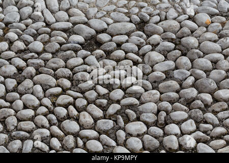 Floor walkway made of small pebbles Stock Photo