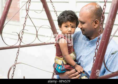 Indian father and daughter outdoor portrait Stock Photo