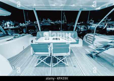 CANNES, FRANCE - SEPTEMBER 9th, 2015. Sitting on the upper deck of the yacht. Luxurious interior of a modern yacht. Yachts anchored in Port Pierre Can Stock Photo