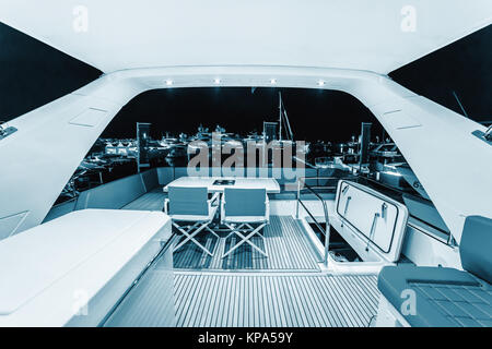 CANNES, FRANCE - SEPTEMBER 9th, 2015. Sitting on the upper deck of the yacht. Luxurious interior of a modern yacht. Yachts anchored in Port Pierre Can Stock Photo