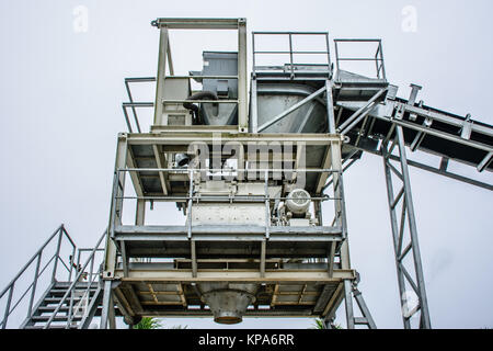batching plant is a machine to create concrete, from sand, stone, cement and water Stock Photo