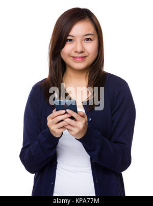 Asian Young Woman use of the mobile phone Stock Photo