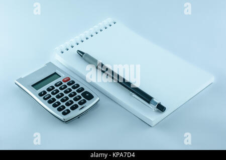 calculator, notepad and pen for your job Stock Photo