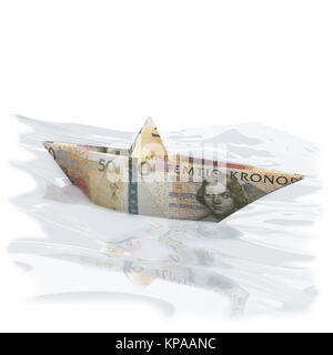 paper boat with 50 swedish crowns Stock Photo