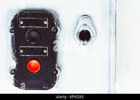 partial view of old Soviet industrial machining workstation. switch with buttons on which it is written in Russian: start and stop Stock Photo