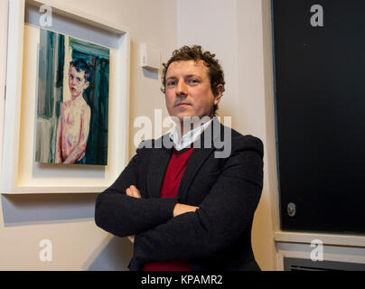 Edinburgh, UK. 14 December, 2017.  Winner of the BP Travel Award 2017, Casper White, with his work 'Jack' painted on material as the 2017 BP Portrait Awards Exhibition opens at the Scottish National Portrait Gallery. Ian Jacobs/Alamy Live News Stock Photo
