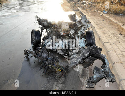 Damascus, Syria. 14th Dec, 2017. Wreckage of a car bomb is seen in Damascus, capital of Syria, on Dec. 14, 2017. The Syrian authorities foiled a suicide car bombing in the capital Damascus Thursday, a day after the army forces and the Islamic State (IS) militants fought south of the capital, according to state news agency SANA. Credit: Ammar Safarjalani/Xinhua/Alamy Live News Stock Photo