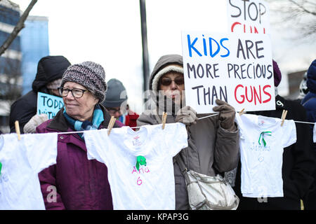 Fairfax, VA, USA. 14th December, 2017. The 60th vigil in memory of the Sandy Hook Elementary School massacre takes place outside of the National Rifle Association on the fifth anniversary of the shooting. Credit: Nicole Glass / Alamy Live News. Stock Photo