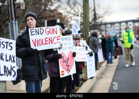 Fairfax, VA, USA. 14th December, 2017. The 60th vigil in memory of the Sandy Hook Elementary School massacre takes place outside of the National Rifle Association on the fifth anniversary of the shooting. Credit: Nicole Glass / Alamy Live News. Stock Photo