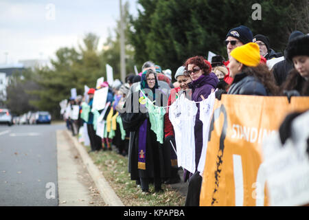 Fairfax, VA, USA. 14th December, 2017. The 60th vigil in memory of the Sandy Hook Elementary School massacre takes place outside of the National Rifle Association on the fifth anniversary of the shooting. Credit: Nicole Glass / Alamy Live News. Stock Photo