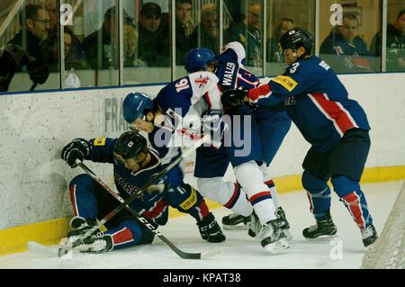 Dumfries, Scotland, 14 December 2017. Great Britain and Korea battle for the puck during their 2018 IIHF Ice Hockey U20 World Championship Division II, Group A match in Dumfries. Credit: Colin Edwards/Alamy Live News. Stock Photo