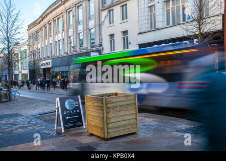 Preston, Lancashire, UK. 15th Dec, 2017. Security Alert. Anti-Terrorist devices, or vehicle buffers have been installed overnight in the cities High Street. Shoppers in Fishergate have now to negotiate around large wooden planters filled with concrete & topped off with winter pansies. The devices designed to thwart a vehicle led attack targeting Christmas shoppers & pedestrians have been greeted with some amusement by residents, variously described as the largest litter bins on the street, an eyesore and a huge obstruction for the visually impaired. Credit: MediaWorldImages/Alamy Live News Stock Photo
