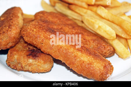 Oven baked Golden brown Fish Sticks with oven baked french fries on the side Stock Photo