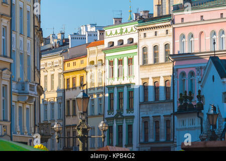 Krakow Market Square, view of a colourful row of buildings on the south side of the Market Square in the center of Krakow, Poland. Stock Photo