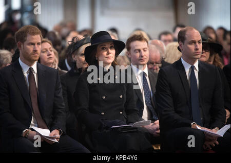 (Front row left to right) Prince Harry with the Duke and Duchess of Cambridge attend the Grenfell Tower National Memorial Service at St Paul's Cathedral in London, to mark the six month anniversary of the Grenfell Tower fire. Stock Photo