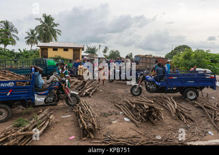 Selling wood at the local market, village near Mafi-Kumase Proper, Volta Region, Ghana, Africa Stock Photo