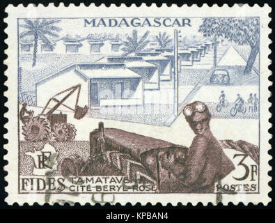 MADAGASCAR - CIRCA 1985: A stamp printed in Madagascar shows farmer , circa 1985 Stock Photo