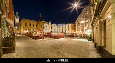 Cold winter evening at the Christmas market on the Stortorget square in the Old Town / Gamla stan, Stockholm, Sweden, Scandinavia Stock Photo