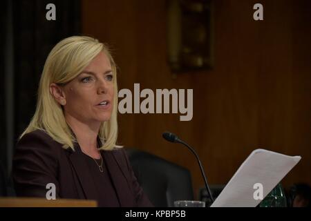 The U.S. Senate Homeland Security and Governmental Affairs committees swear in Kirstjen Nielsen as the 6th Secretary of the Department of Homeland Security November 8, 2017 in Washington, DC. Stock Photo