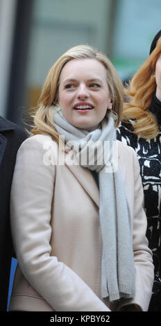 NEW YORK, NY - MARCH 23: Elisabeth Moss, Matthew Weiner, John Slattery, January Jones Christina Hendricks and Jon Hamm attend 'Mad Men' art installation Unveiling at Time & Life Building on March 23, 2015 in New York City.   People:  Elisabeth Moss Stock Photo