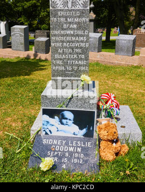 Granite gravestone in memory of an unknown child who died in the Titanic disaster, Fairview Cemetery, halifax, Nova Scotia, Canada. Stock Photo