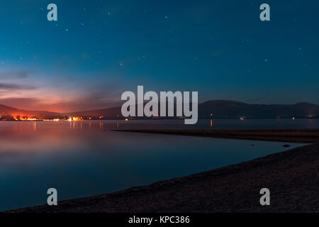 Colourful sunset over Loch Lomond Scotland Stock Photo