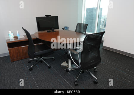 Small meeting room of a modern corpporate office situated in downtown.area. Stock Photo