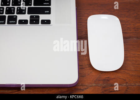 Close up laptop on work station Stock Photo