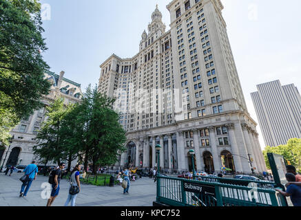 NEW YORK - JUL 17: The Manhattan Municipal Building in July 17, 2014 on NYC. It is a 40-story building built to accommodate increased governmental spa Stock Photo