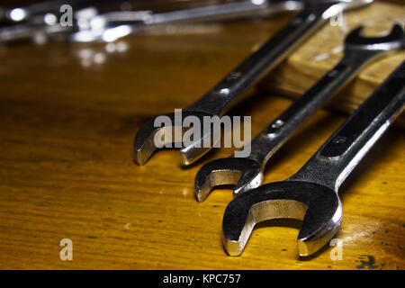 Horizontal photo of a set spanner on a wood table Stock Photo