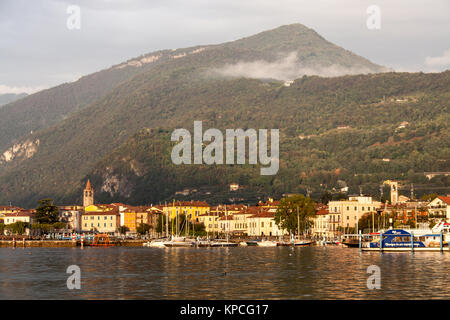 Lake Iseo, Italy. Picturesque dusk view of Lake Iseo, and the town of Iseo. The scene was captured looking eastwards from the southern shores of Lake  Stock Photo