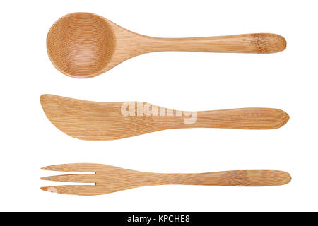 natural wooden spoon and fork, knife isolated on wood background Stock Photo