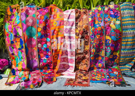 SAN PEDRO, BELIZE-DEC 18, 2015: Traditional handmade rugs at the street market in San Pedro islandn on Dec 18, 2015., Belize. Stock Photo