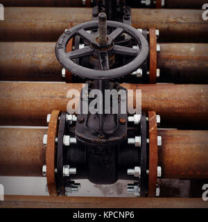 Oil and gas pipeline valves on a piping Stock Photo