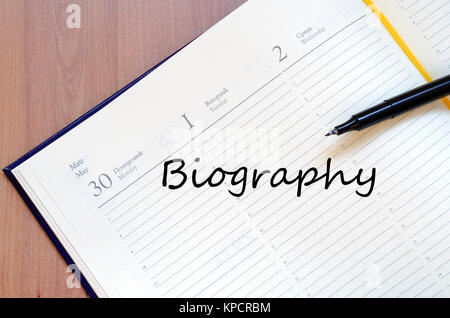 Biography write on notebook Stock Photo