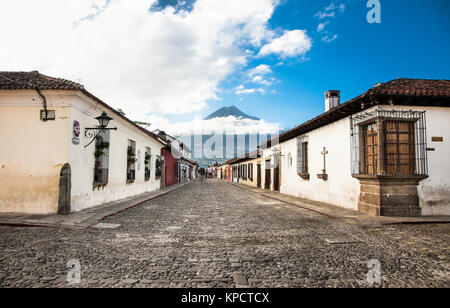 Colonial houses in tha street view of Antigua, Guatemala.  The historic city Antigua is UNESCO World Heritage Site since 1979. Stock Photo