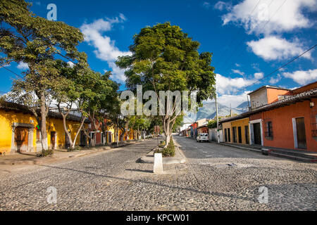 Colonial houses in tha street view of Antigua, Guatemala.  The historic city Antigua is UNESCO World Heritage Site since 1979. Stock Photo