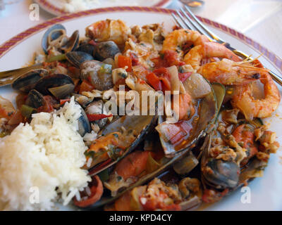 A traditional Portuguese meal seafood Cataplana. Stock Photo