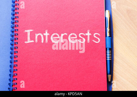 Interests write on notebook Stock Photo