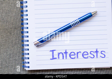 Interests write on notebook Stock Photo