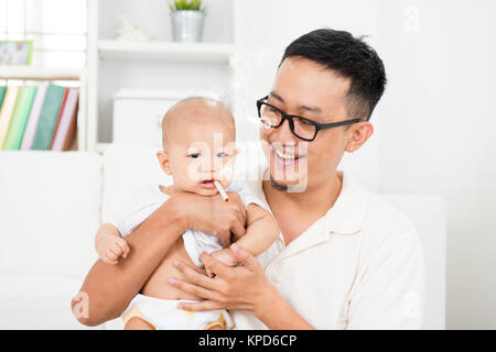 Baby with cigarette Stock Photo