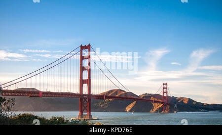 View of the sunset over the Golden Gate bridge in San Francisco Stock Photo