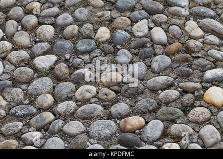 Floor walkway made of small pebbles Stock Photo