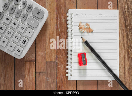 Paper note with pencil and calculator Stock Photo