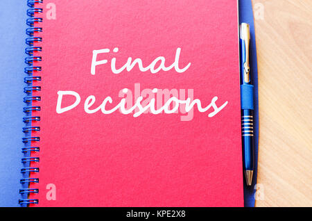 Final decisions write on notebook Stock Photo