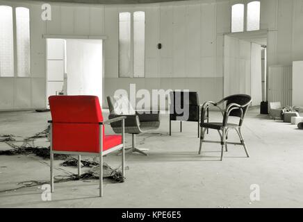 Seating in an abandoned disused club on the outskirts of the city of Magdeburg Stock Photo